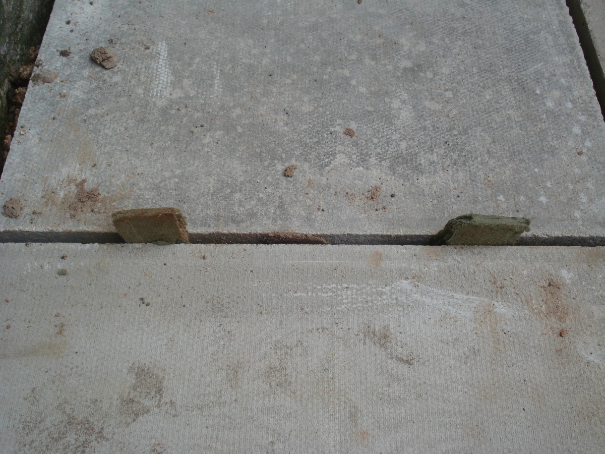 Use spacers between the flagstone to keep joint equal and straight