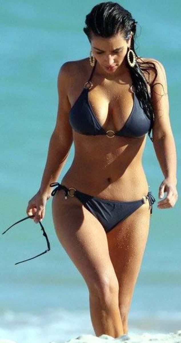 The shade of blue gets really dull when wet. This bikini almost looks grey when Kim Kardashian steps out of the water.