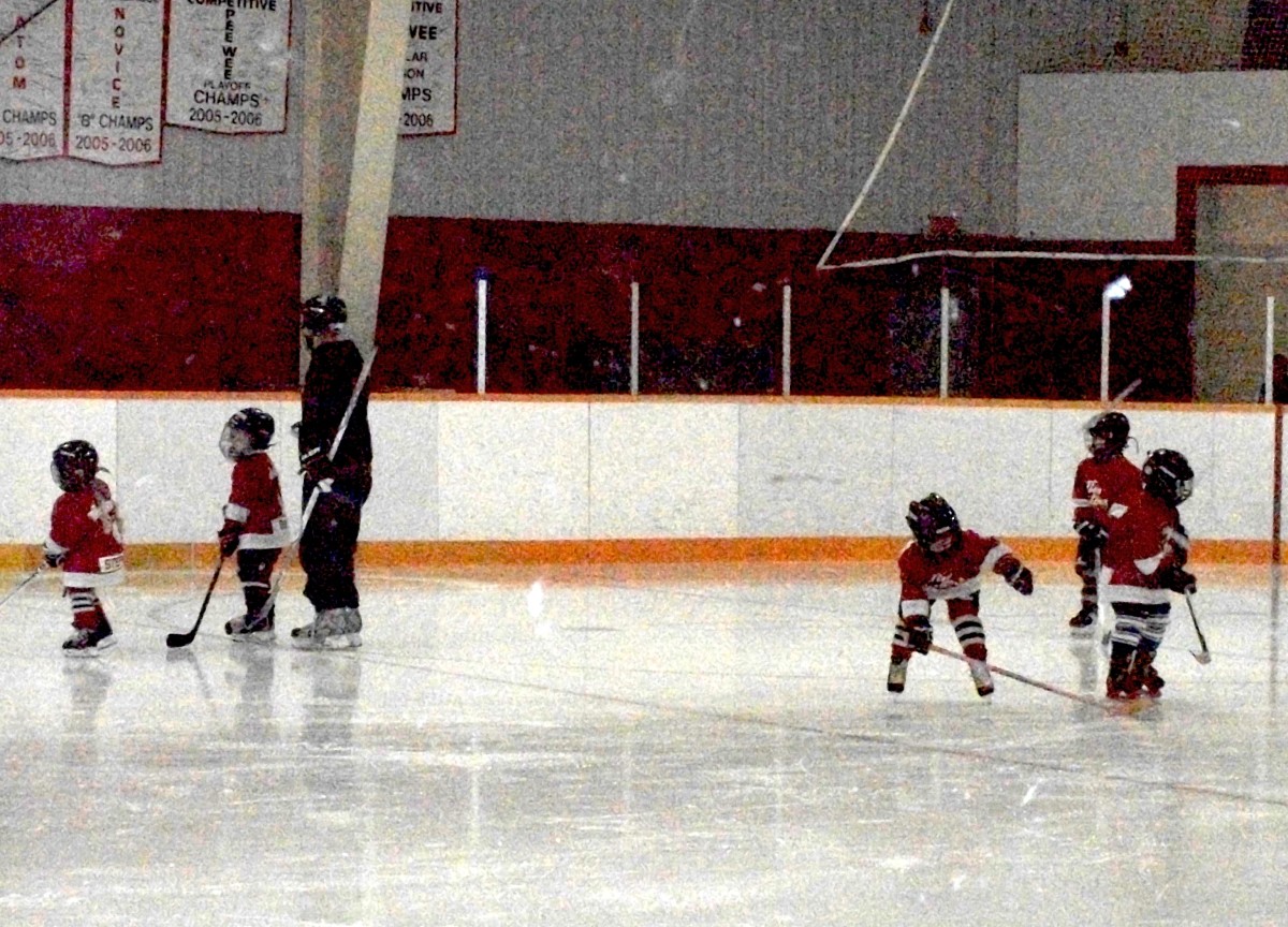 Youth playing hockey