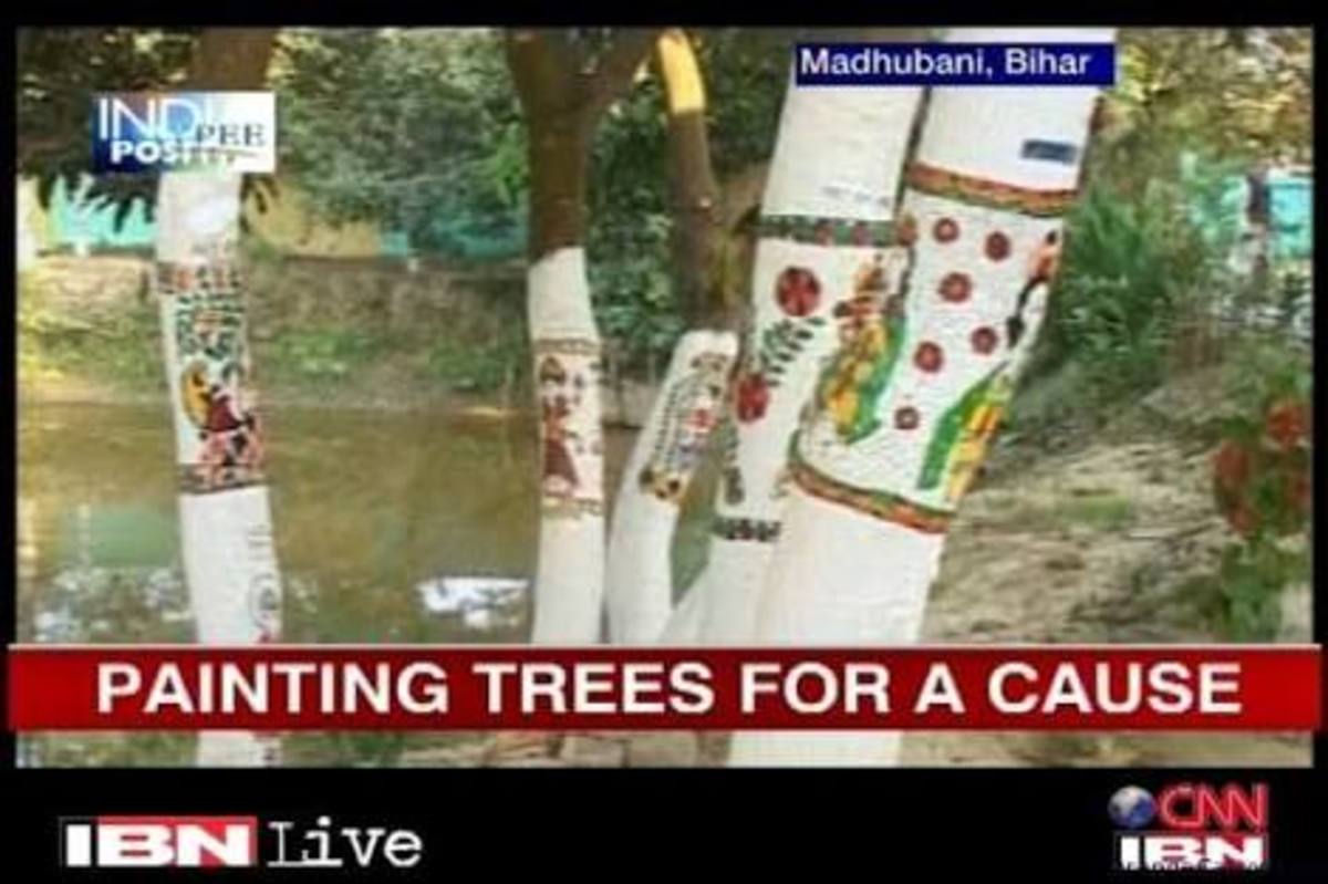Madhubani画在树上传达了一个信息，也防止了森林砍伐。