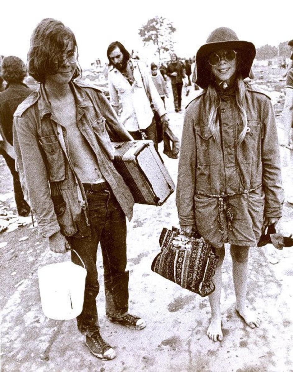These two hippies are ready for Woodstock! Do you see naivity and innocence in this picture? Isn't it beautiful? (Makes me think of dressing up in my mom and gram's clothes when I was just little!)  