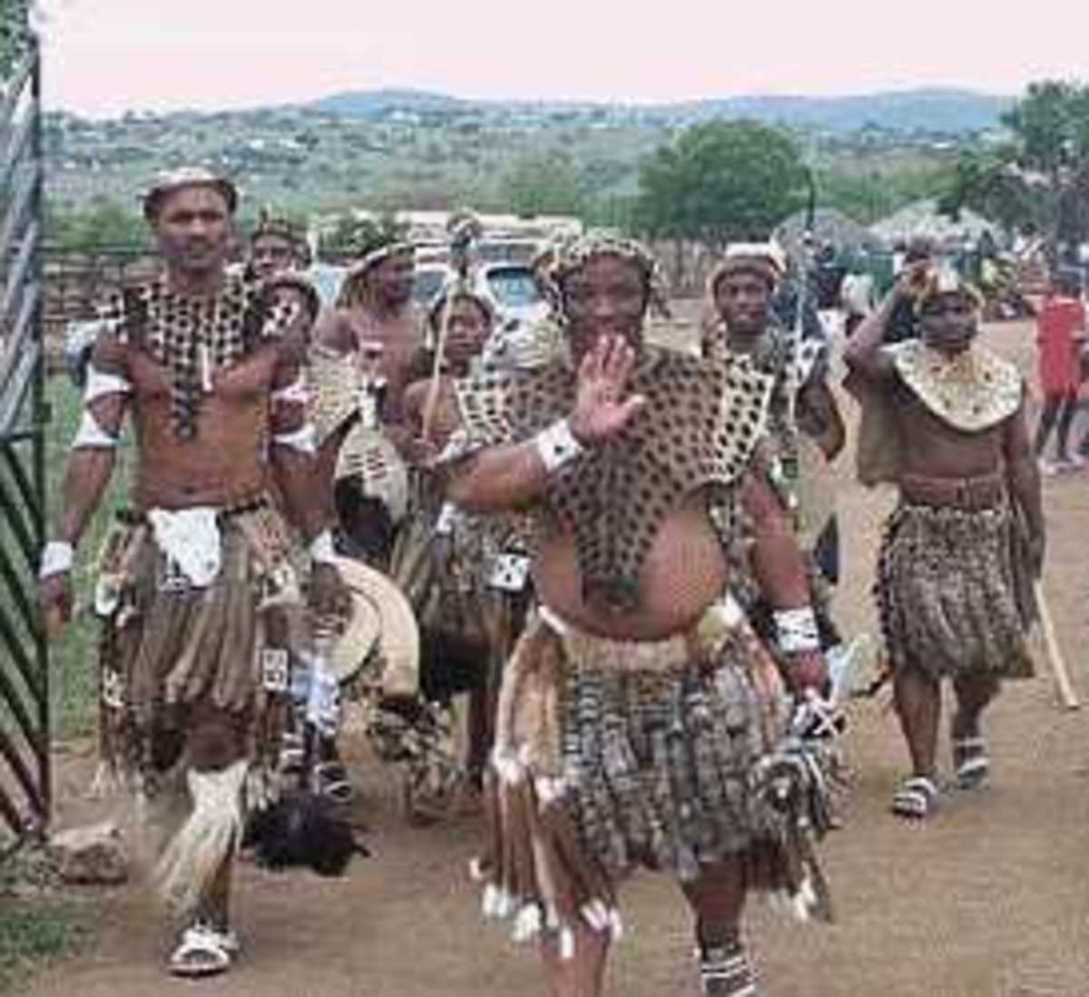 Zulu men dressed in full Zulu traditional regalia, note their shoes,"mbatata" made of car tires