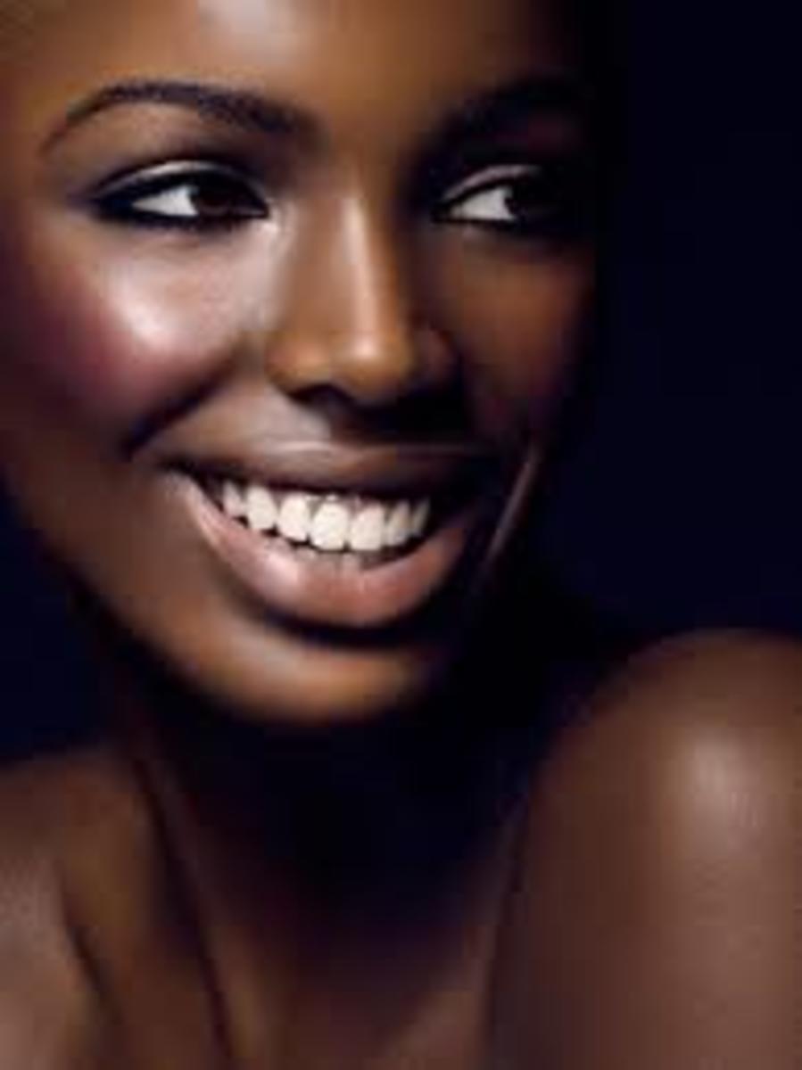Regarding women, the lighter they are, the more beautiful and feminine. Pertaining to Black women, they can be acceptably dark but NOT TOO DARK.Very dark-skinned Black women are viewed as not feminine nor attractive. 