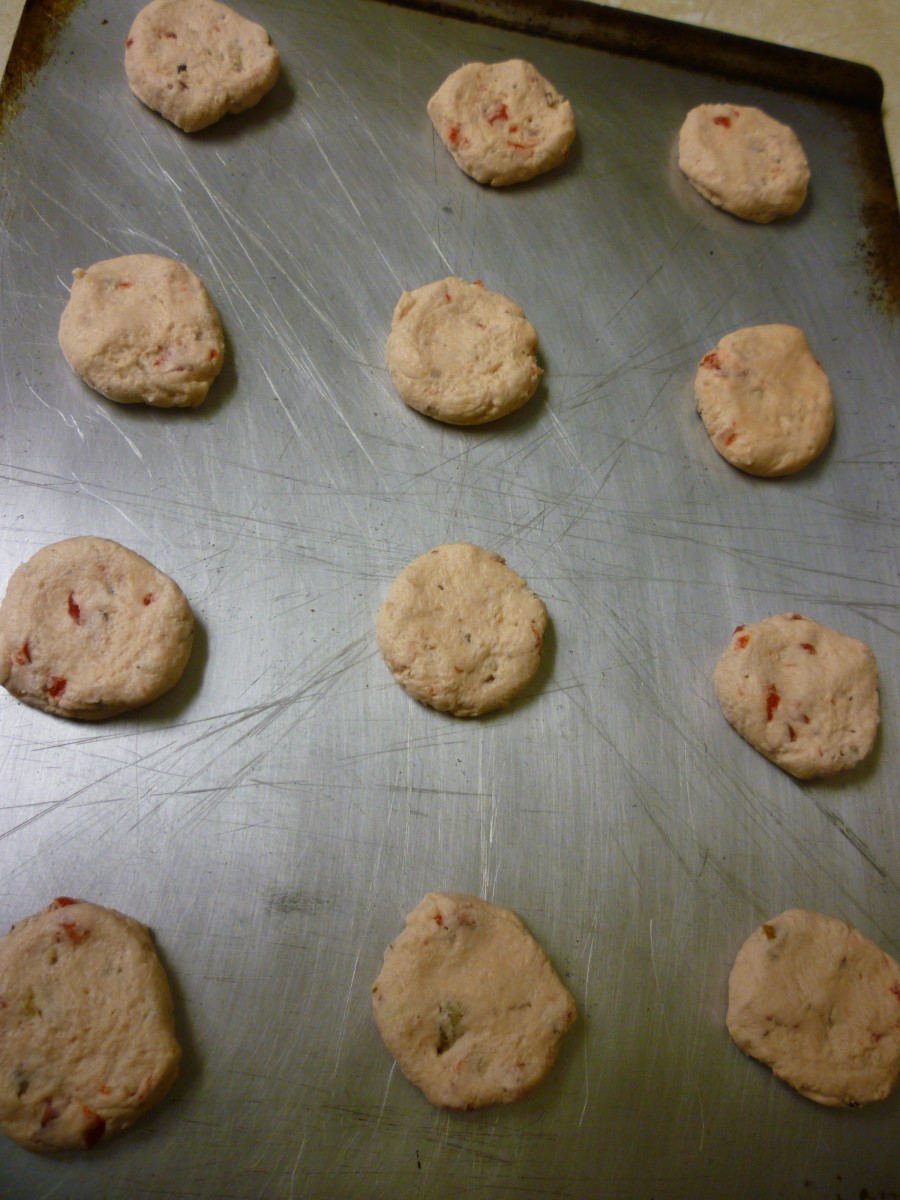 M-M-M cookies after being rolled into balls and flattened on a cookie sheet, and ready for baking.