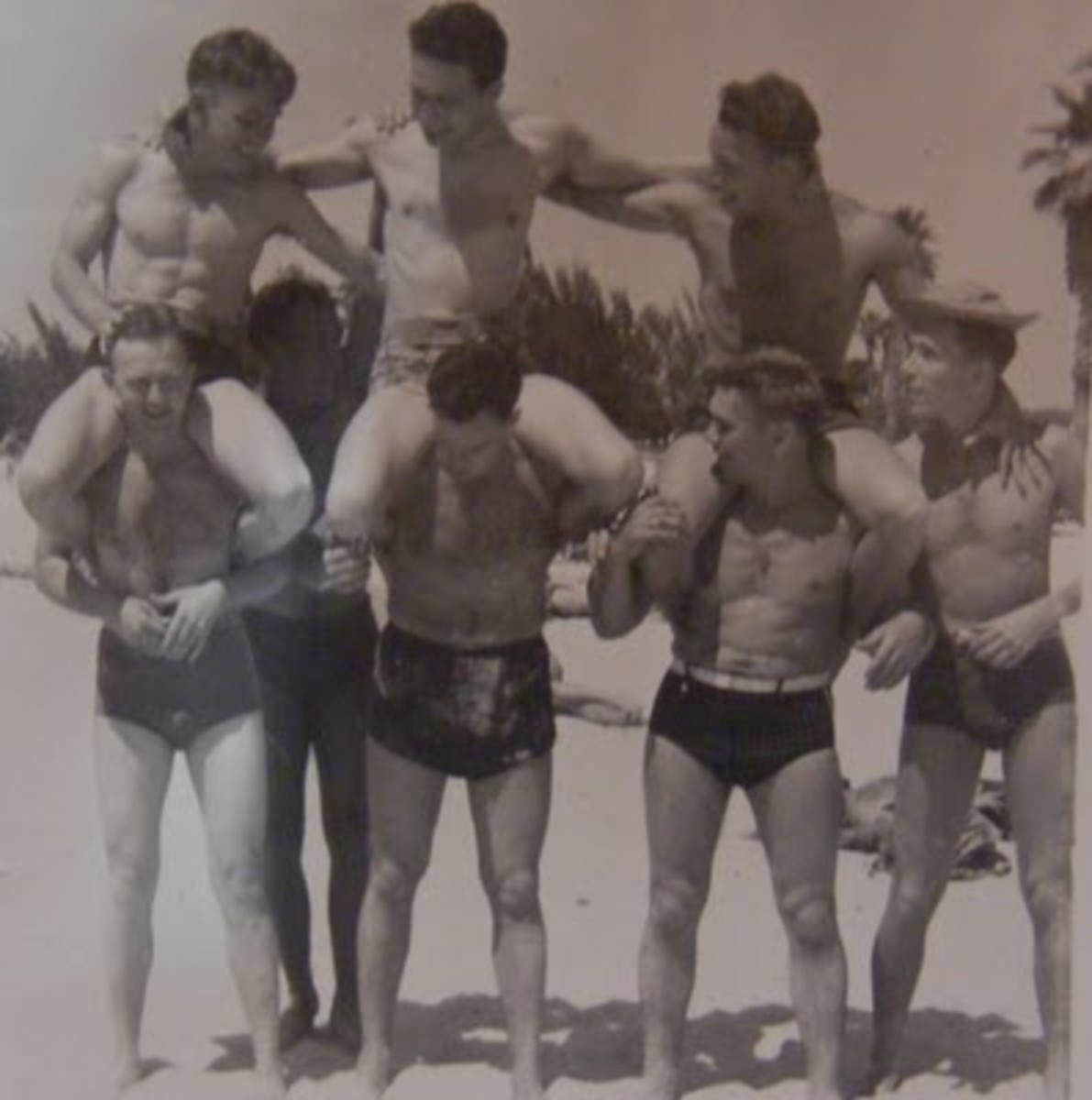 Back in those days, those surfer shorts did not exist; men could wear Speedos without having their sexuality thrown into question