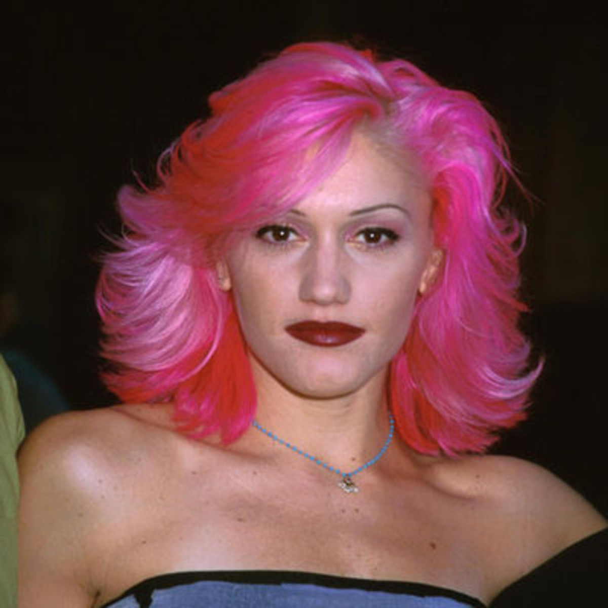 A Young Gwen Stefani with the Perfect Flip Hairdo in a Hot Pink Hair Color