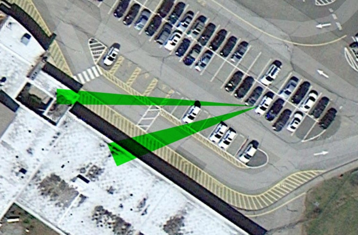 PLEASE NOTE: This is from google maps, not from photos of the incident, so the cars aren't exact . Rousseau's car was parked in the 5th spot in and in the front row, there were cars in the 3rd, 4th, and 7th spot.