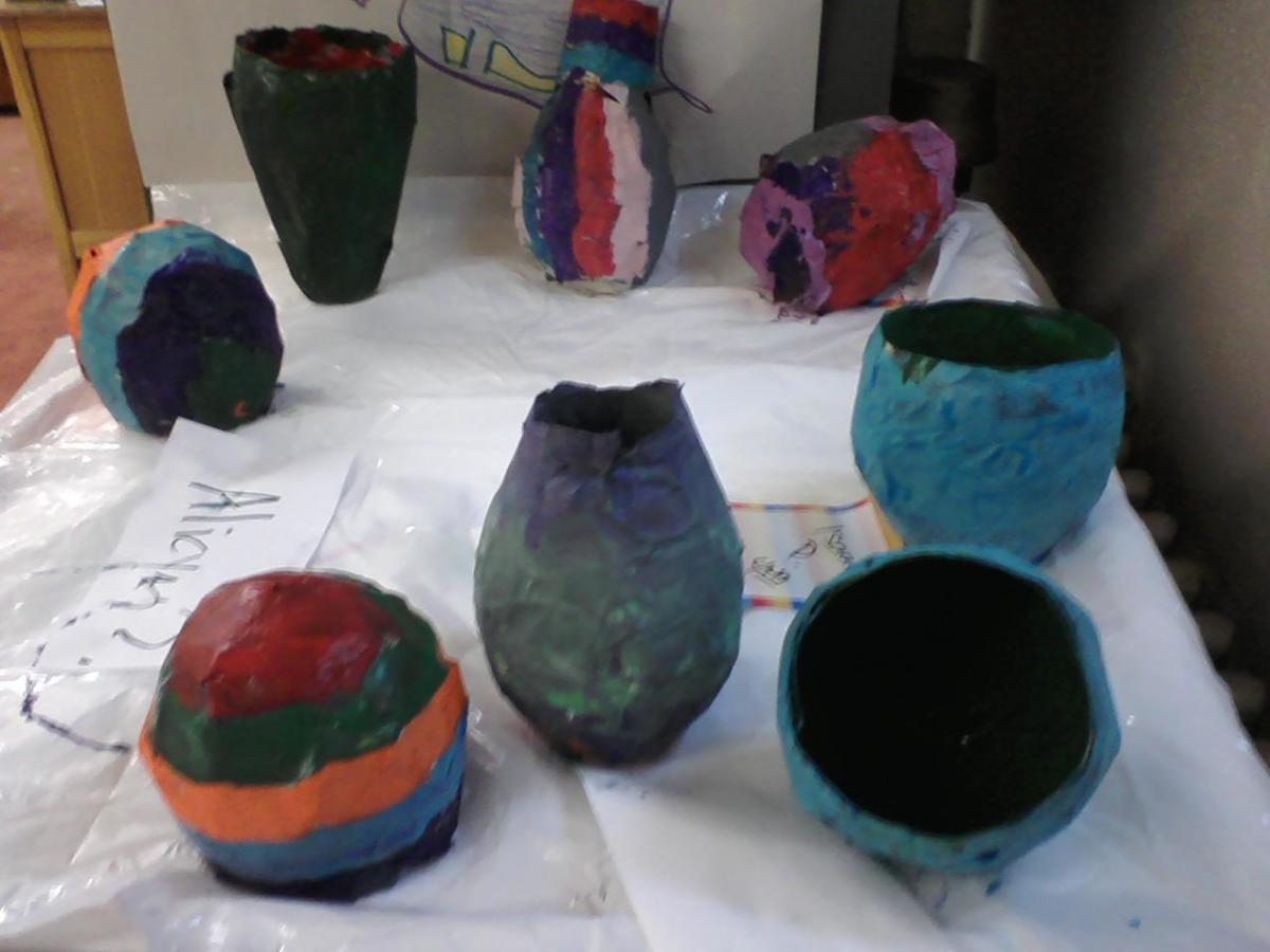 Fourth graders paper mache bowls