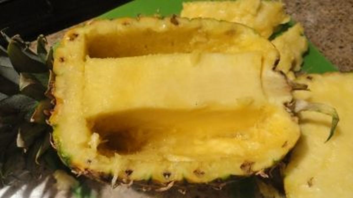 Cut out the fruit on both sides of the core first. Then cut out the middle in small sections.