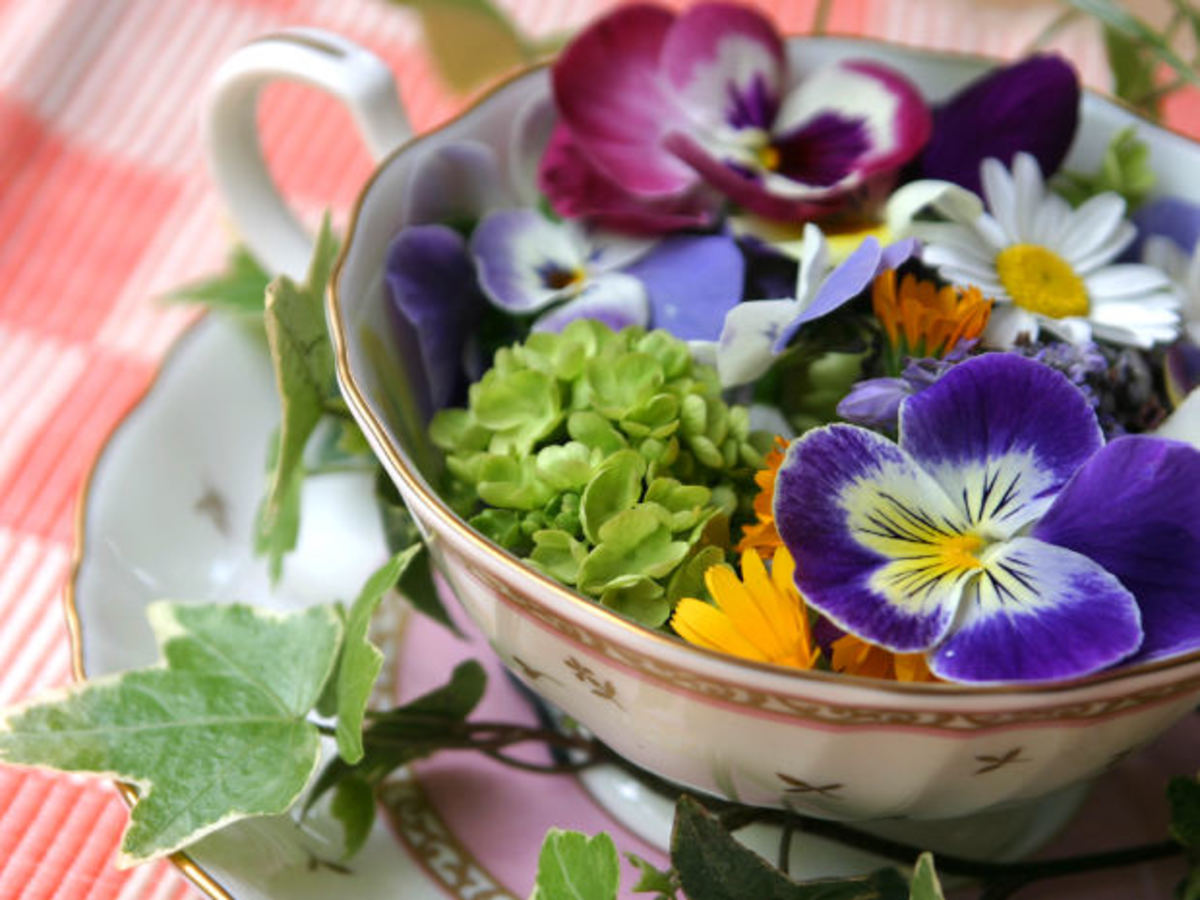 1. Turn tea cups into vases for flowers