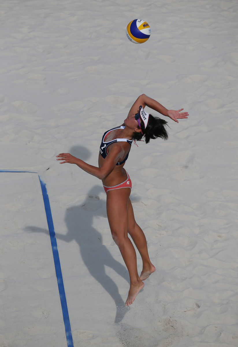 Ayumi Kusano does a jump serve.
