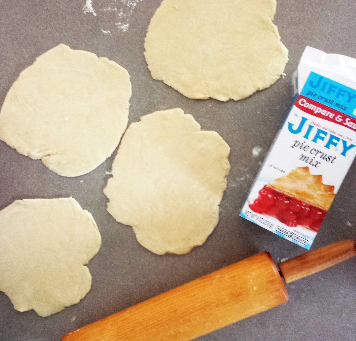 Prepare the pie crust mix according to package instructions, then roll dough out into 4 circles.