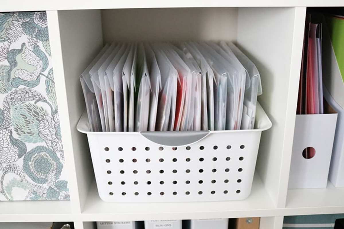 This system uses snap closure envelopes in a dollar tree bin,