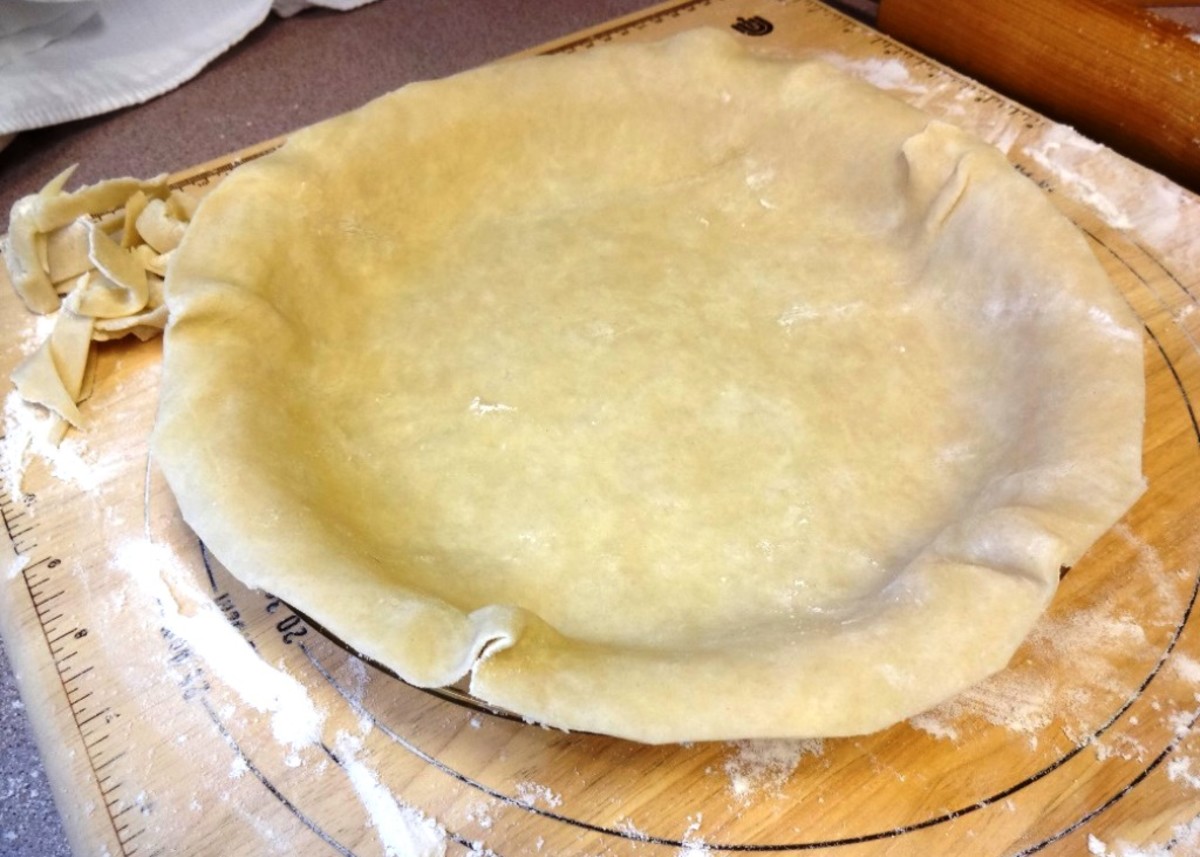 Leave enough crust to form the crust, about half an inch over the edge of the pan