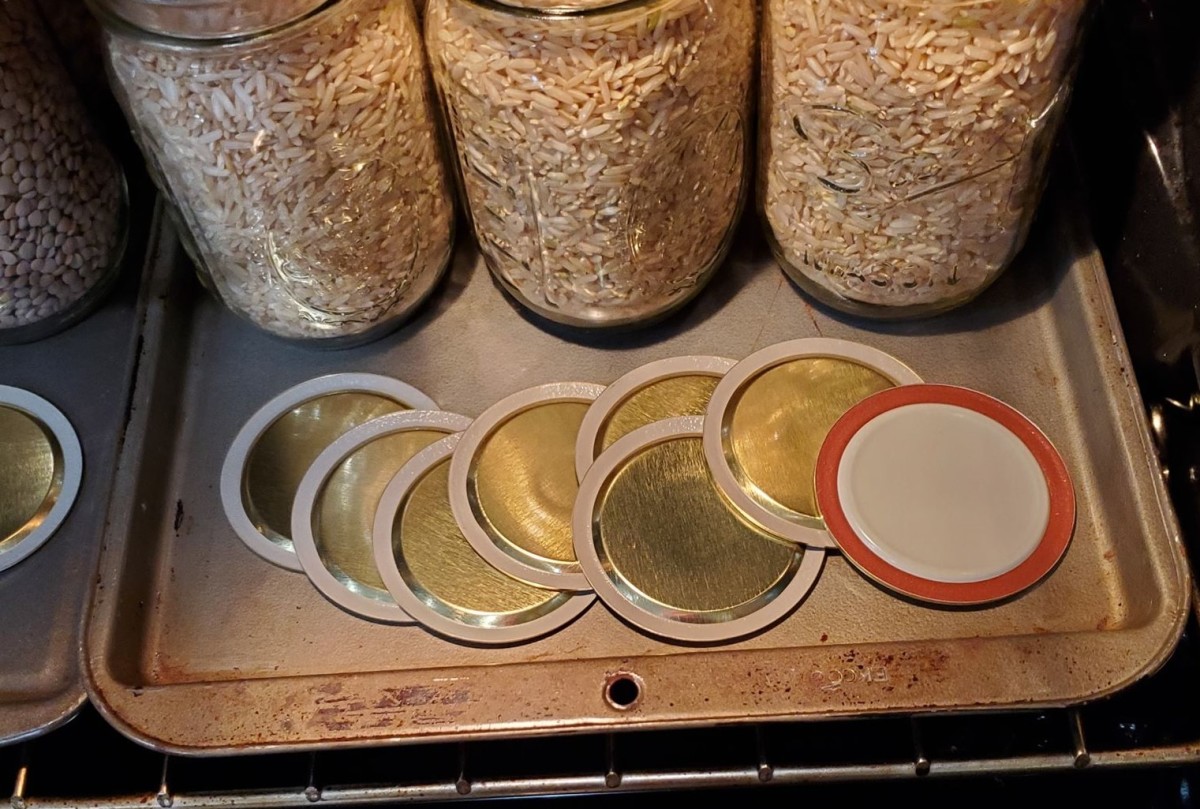 Heat lids for 15 minutes in the oven. I just place in front of the jars as pictured here.
