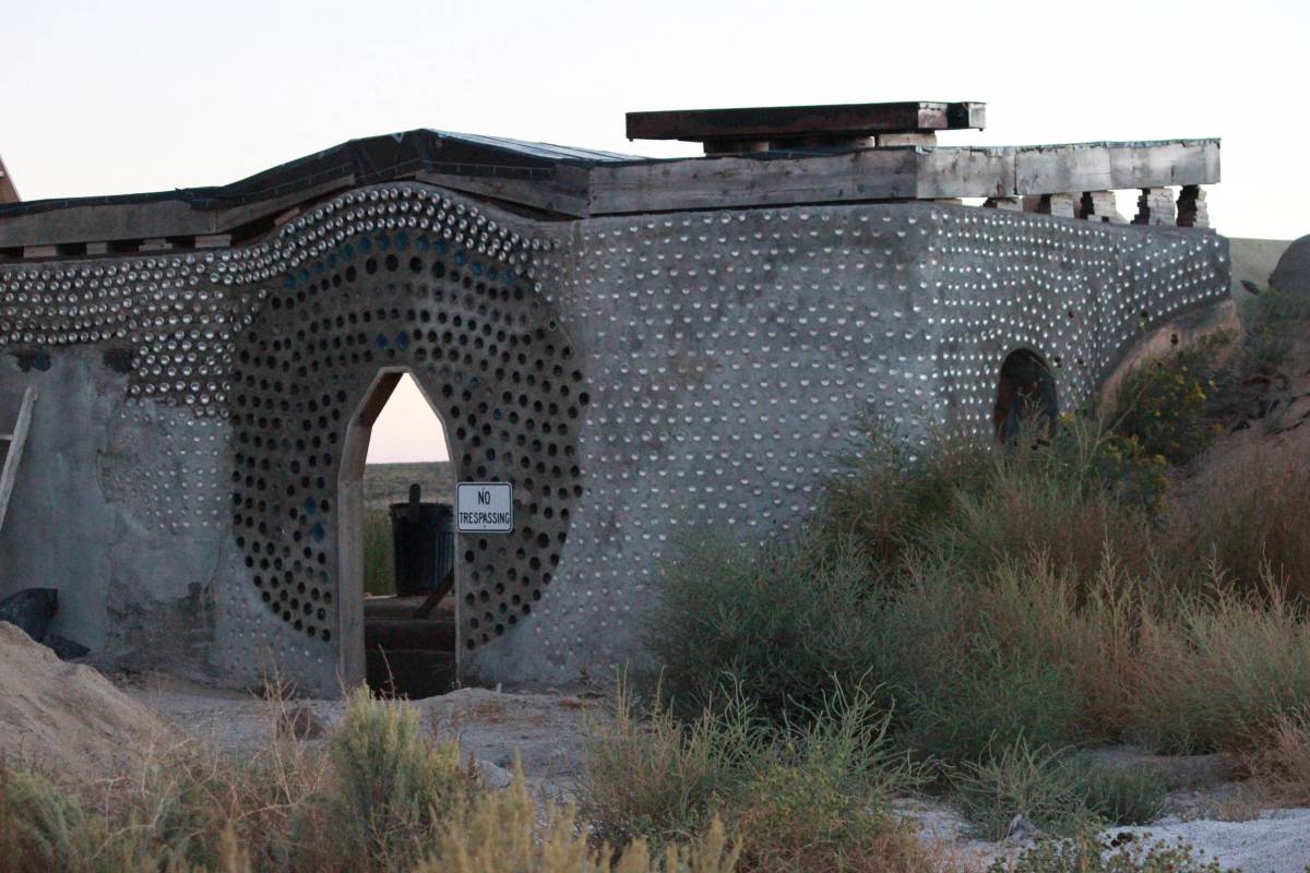 Earthship of Taos, New Mexico.  Earthships take a little longer to build than more traditional structures.