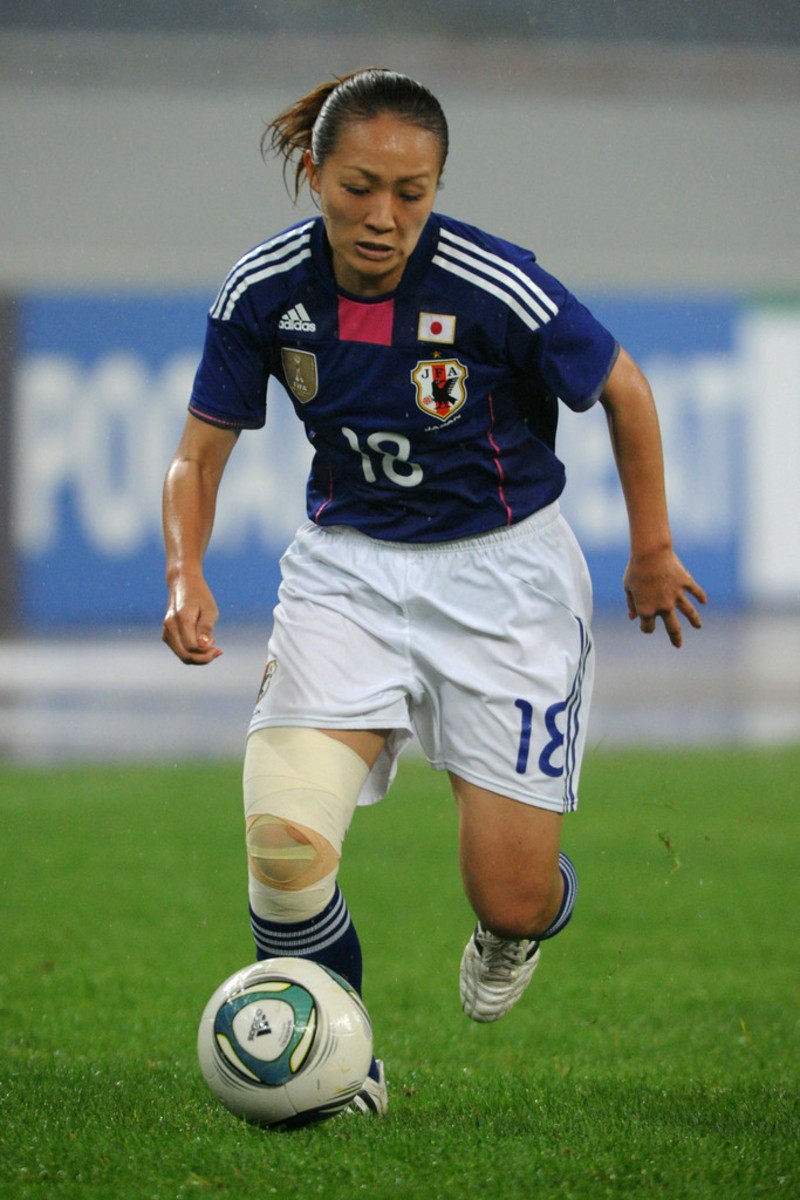 Karina Maruyama plays during a qualifying match between Japan and China in Jinan, China.