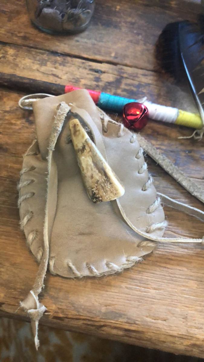 Replica Medicine Pouch I made using a Bison Tooth. Note the teeth were used as trade beads in the 1700's.  
