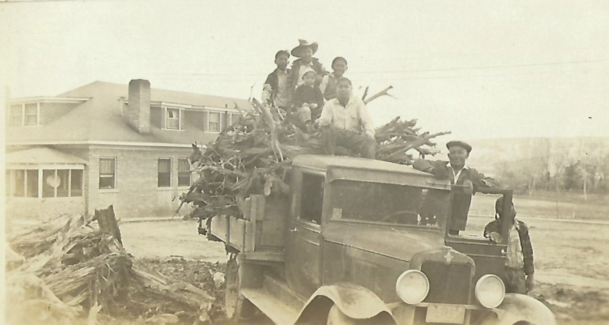 Wood and students on a truck.