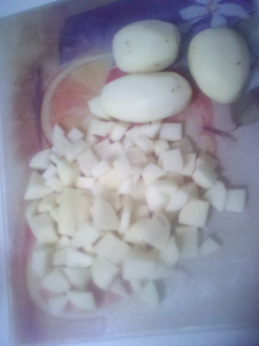 Cubed potatoes wait their turn.