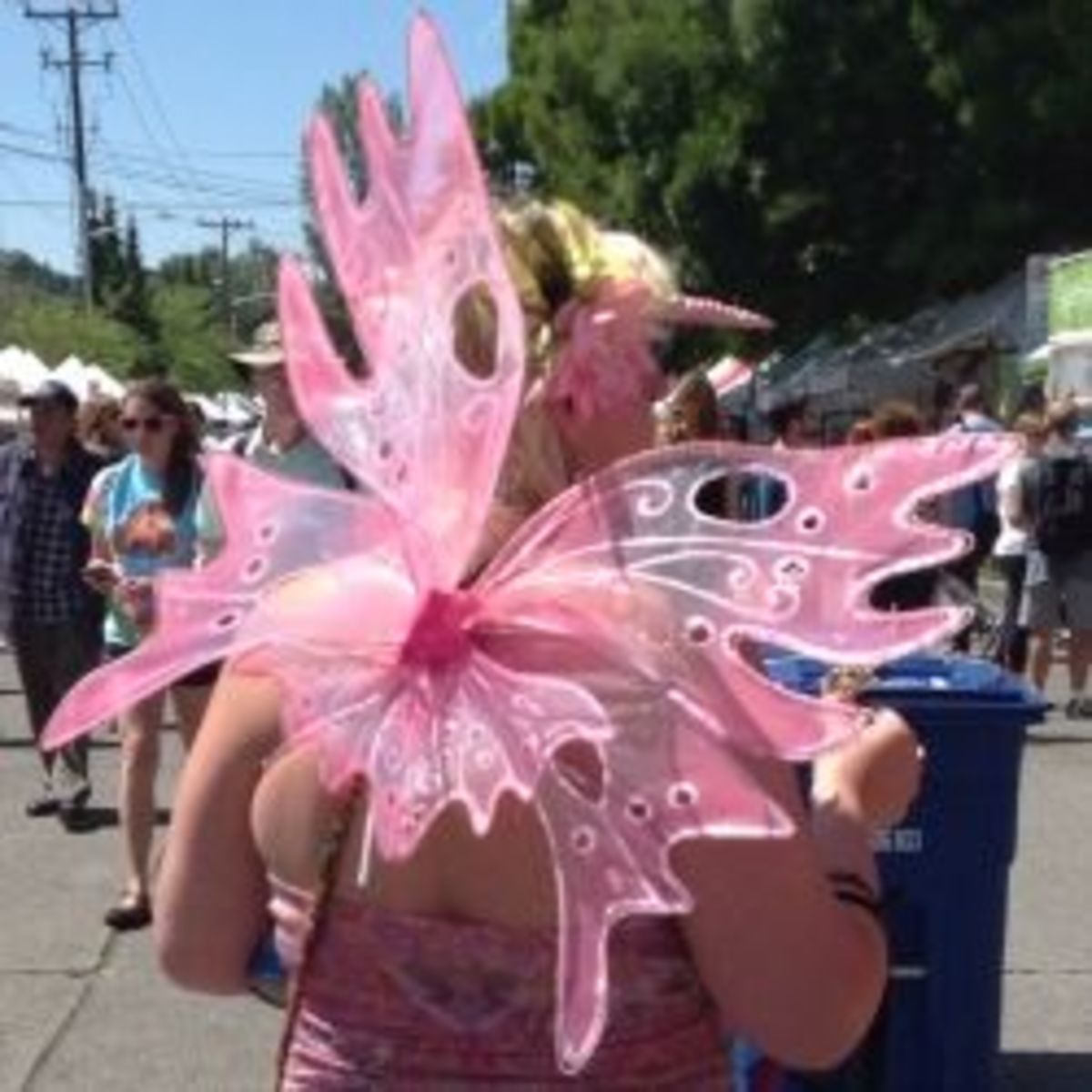 These pink wings have elaborate shapes and a few cut-outs.
