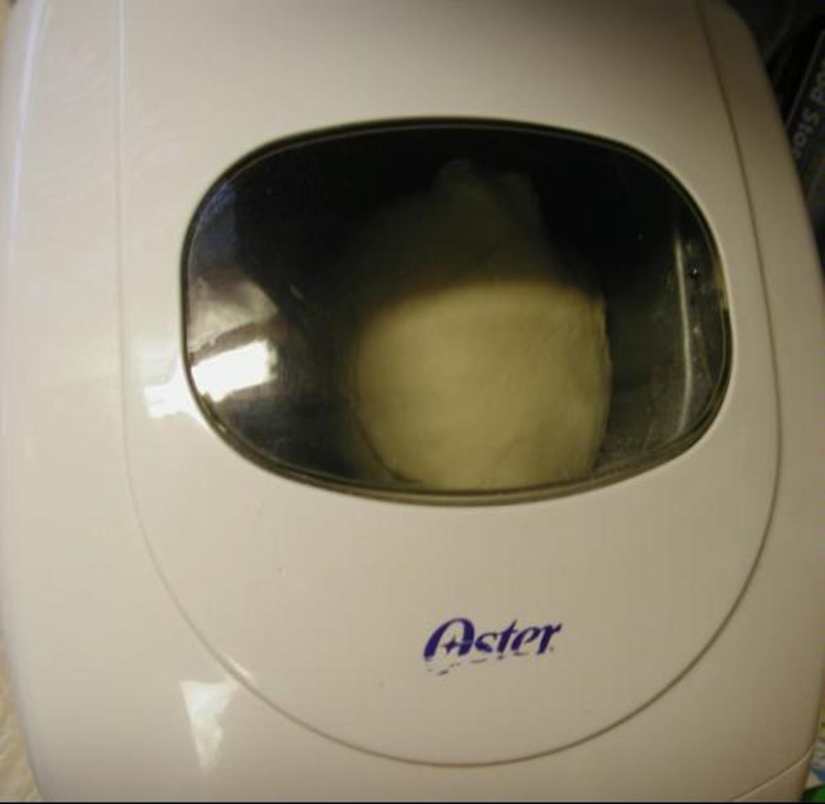 Using The Bread Machine - You want the dough to form a smooth ball.
