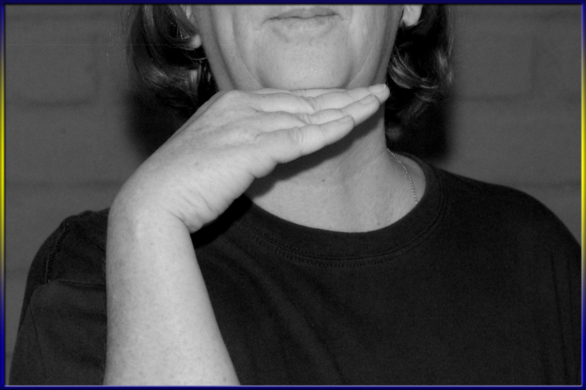 File:Woman making hand gesture 