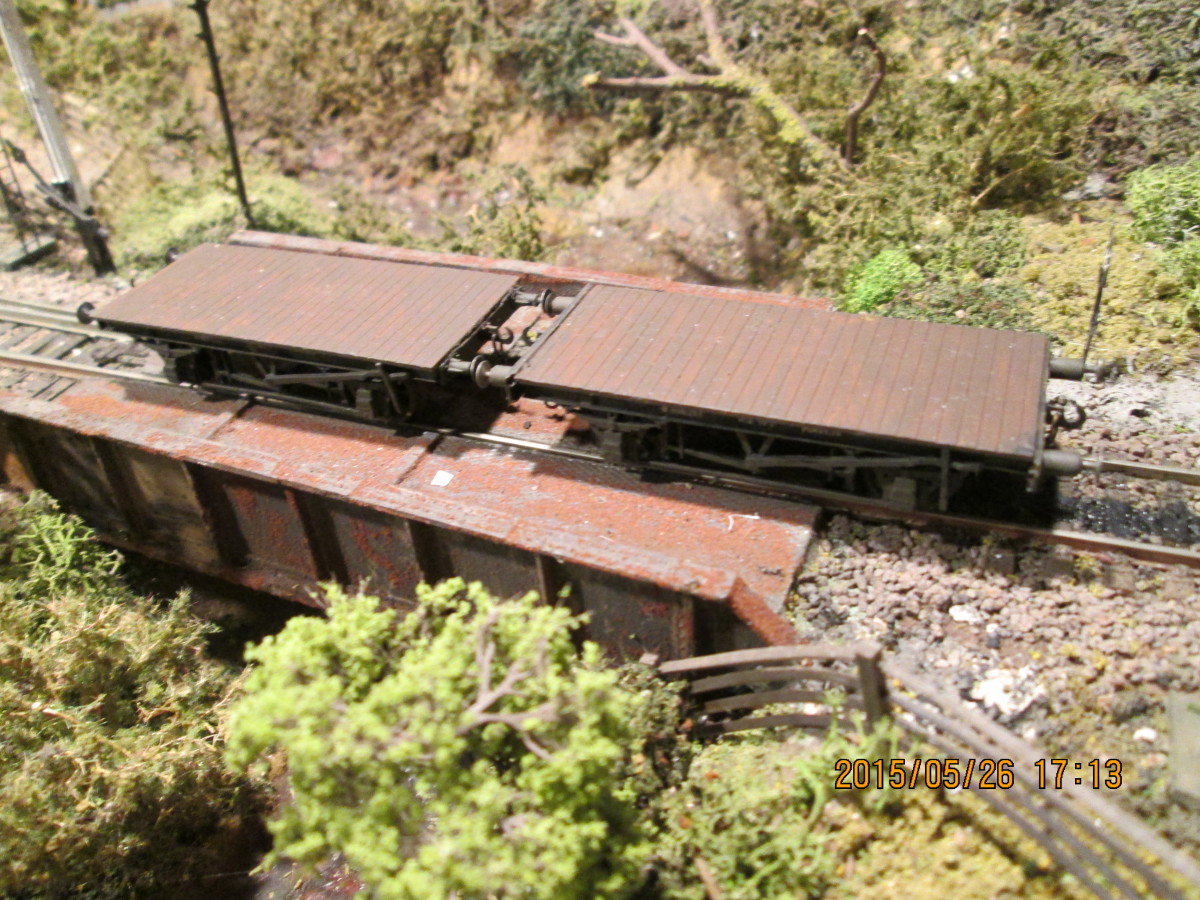 A pair of 'Match trucks', wagon flats without sides that were used on either end of a load longer than a bogie bolster wagon to safeguard the load and the wagon its chained to. 