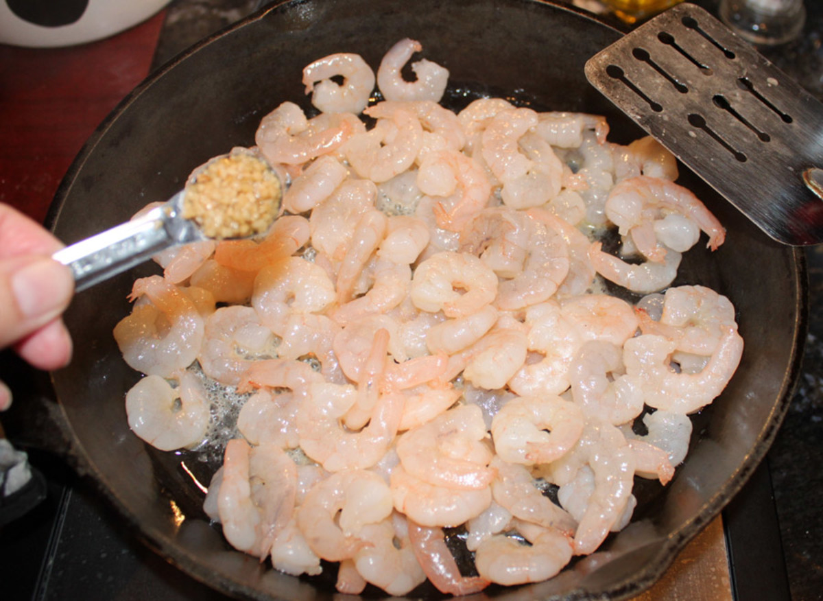 Add garlic to your cooking shrimp.