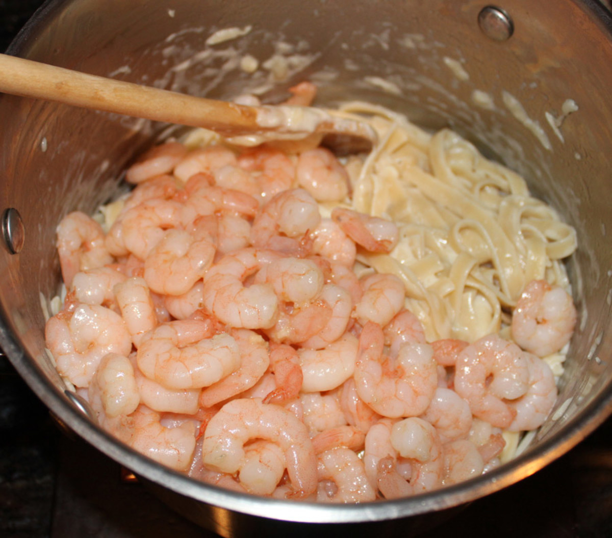 The final step is to stir in your cooked shrimp.