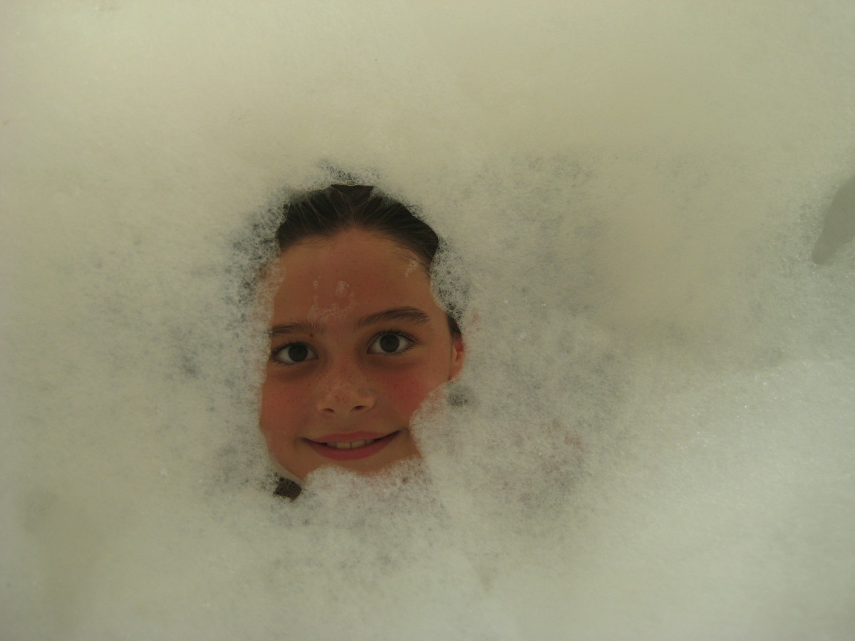 Rainy-Day Activity #8: A mega bubble bath is good clean fun after some of the messier activities, such as face painting or pudding pictures.