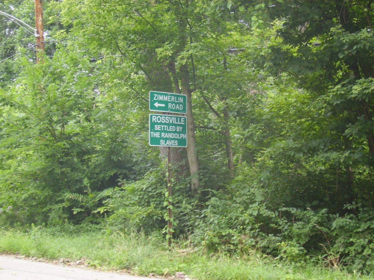 Sign on crossroad(Dixie Dr.), showing where Rossville is located.