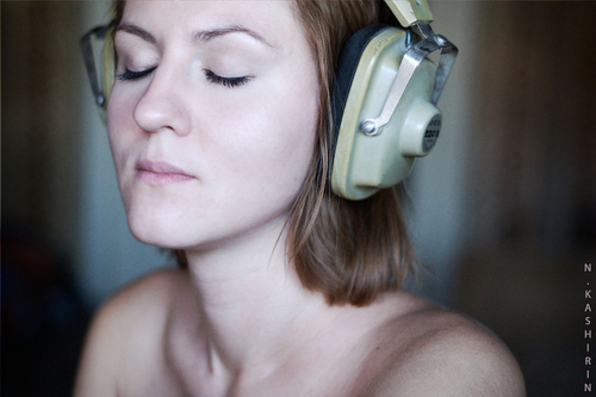Woman listening to relaxing meditation music.