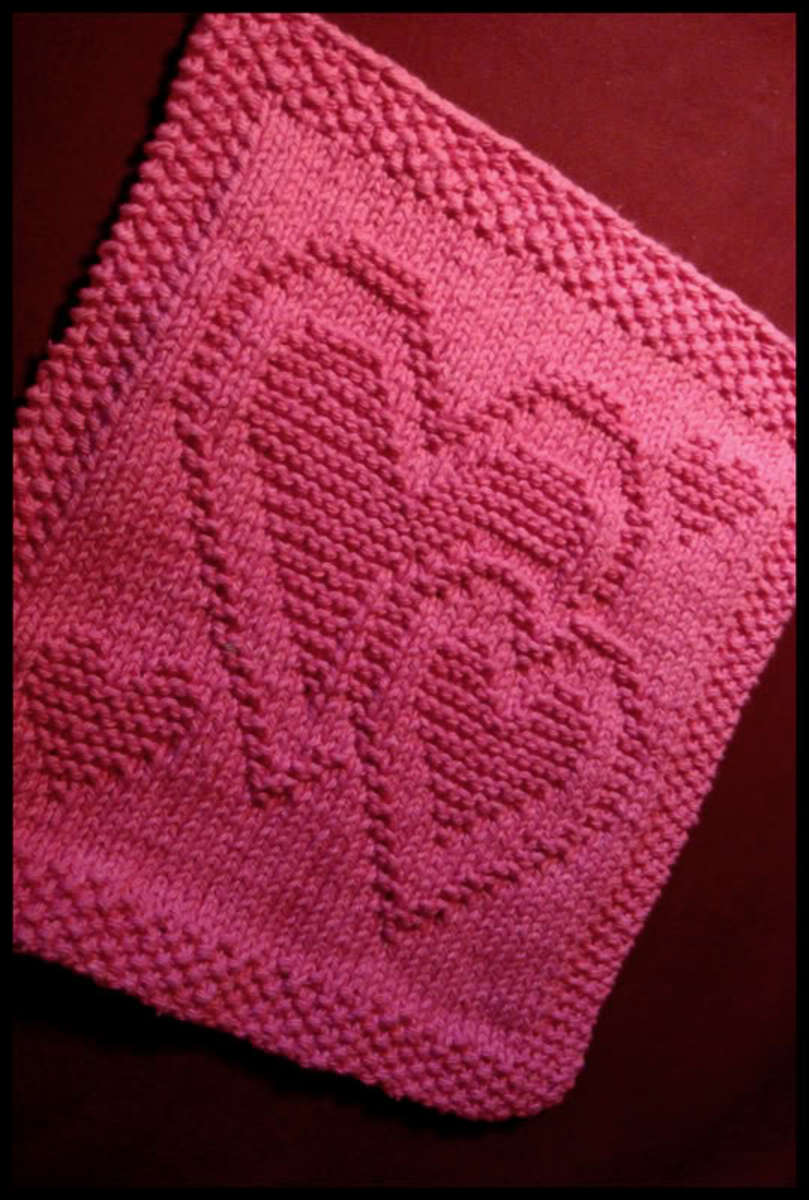 A Valentine Surprise Pink...A valentine Surprise. Fast and easy this cloth should knit up in no time ready for Valentine's Day. Or make it as a sweet