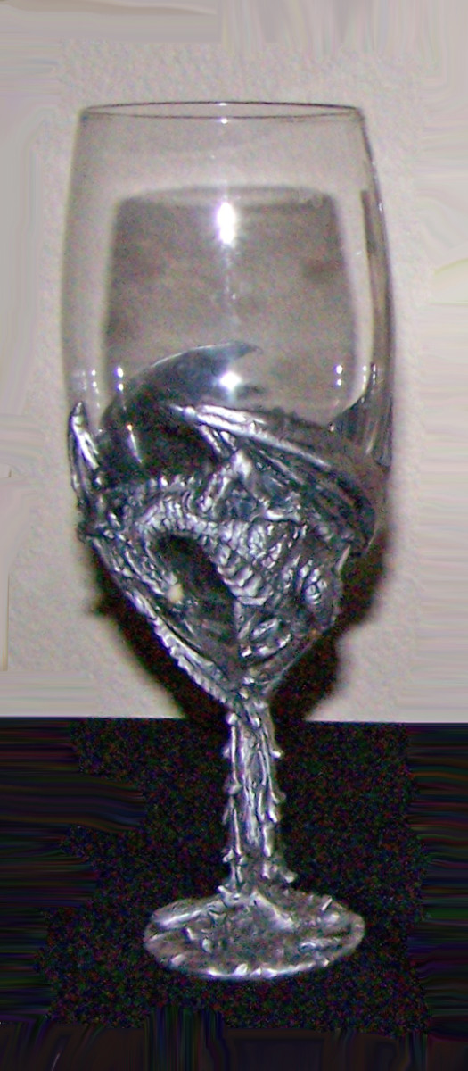 My Wiccan ritual cup-- this is the chalice I mainly use. I have a couple of others that are simple. This was a gift from someone close and I treasure it.