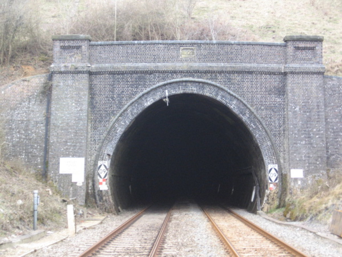 From a distance a railway tunnel looks like its "mouth" is wide open