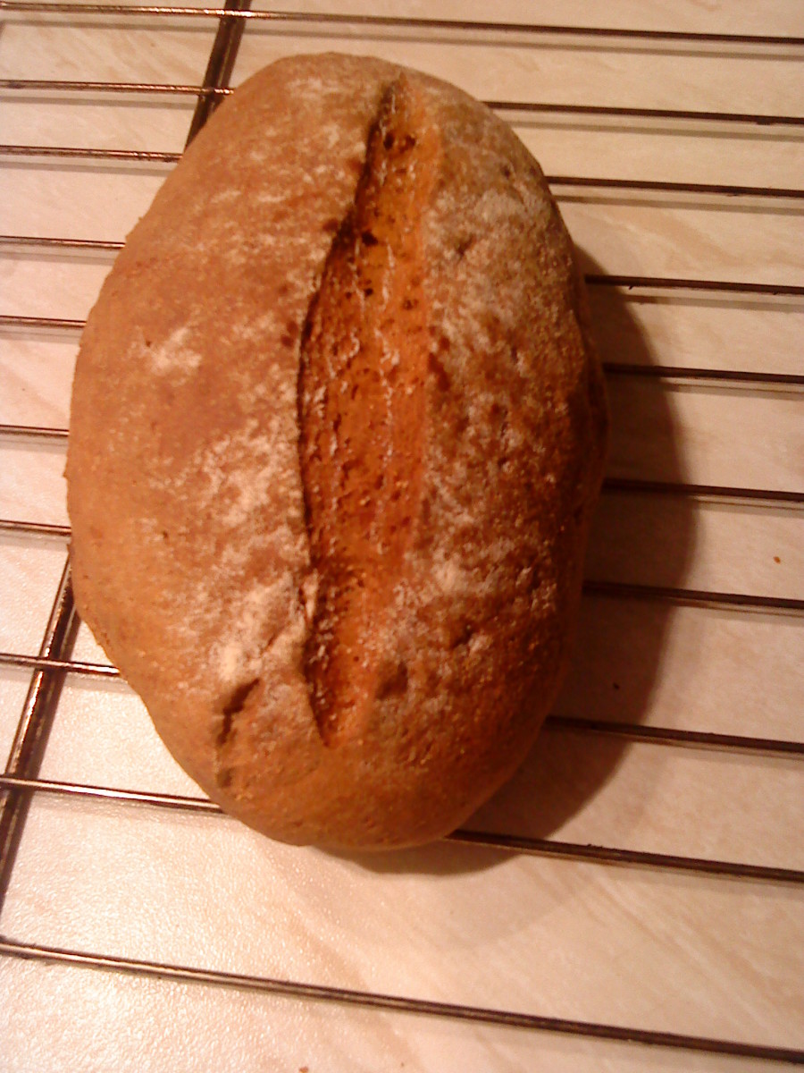 Wholemeal molasses loaf, straight out of the oven.