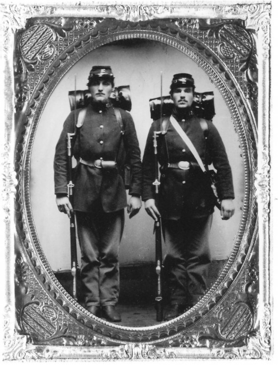 Two Union Volunteers pose for an ambrotype photograph circa 1861