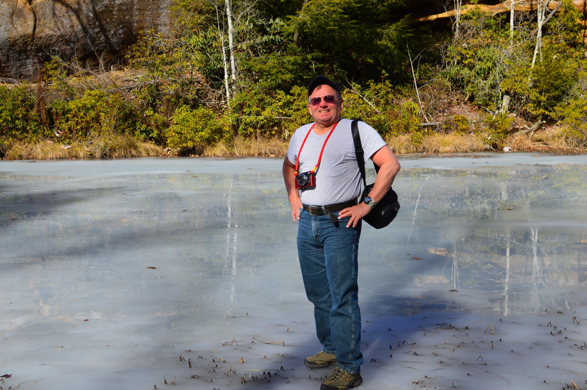  Walking on a frozen Pickett Lake on a 60 degree day.