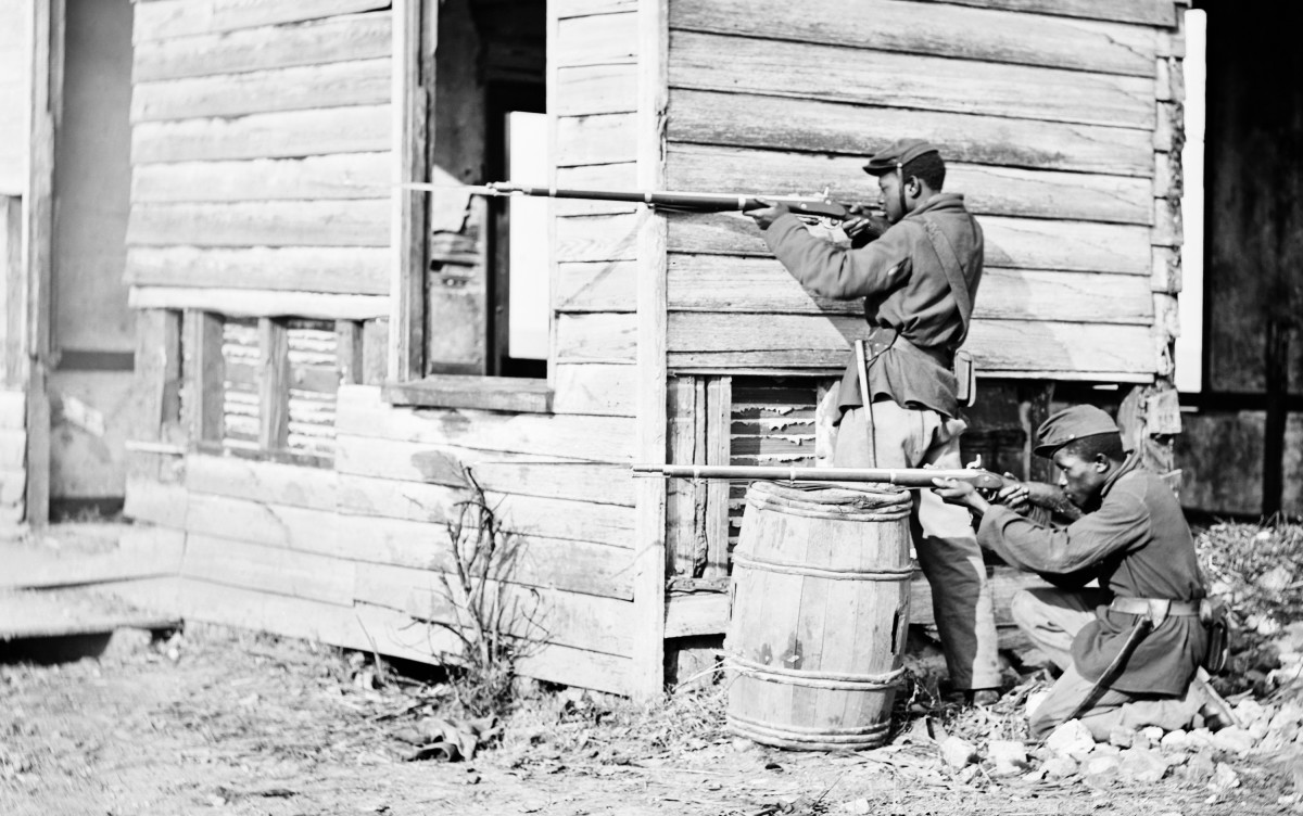 Staged photo of colored troops "in combat" near Dutch Gap in VA