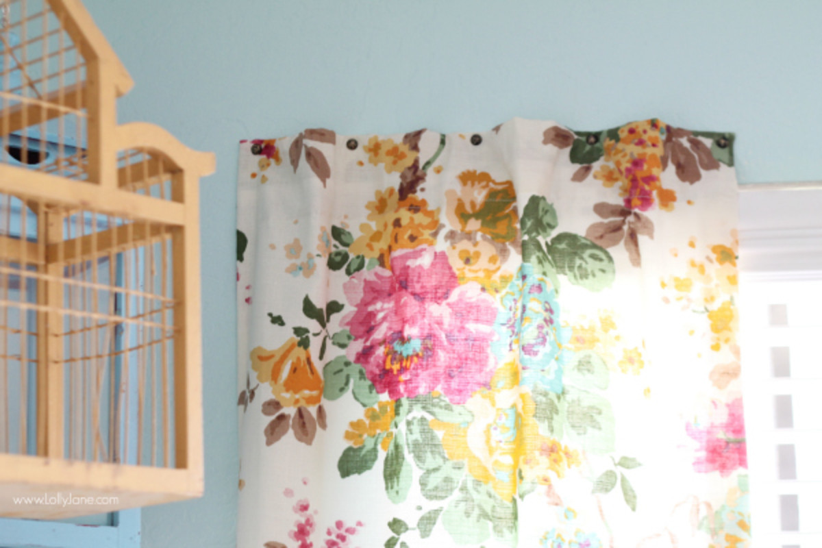 For stationary curtains, it's easy to hang them without a rod using upholstery tacks.
