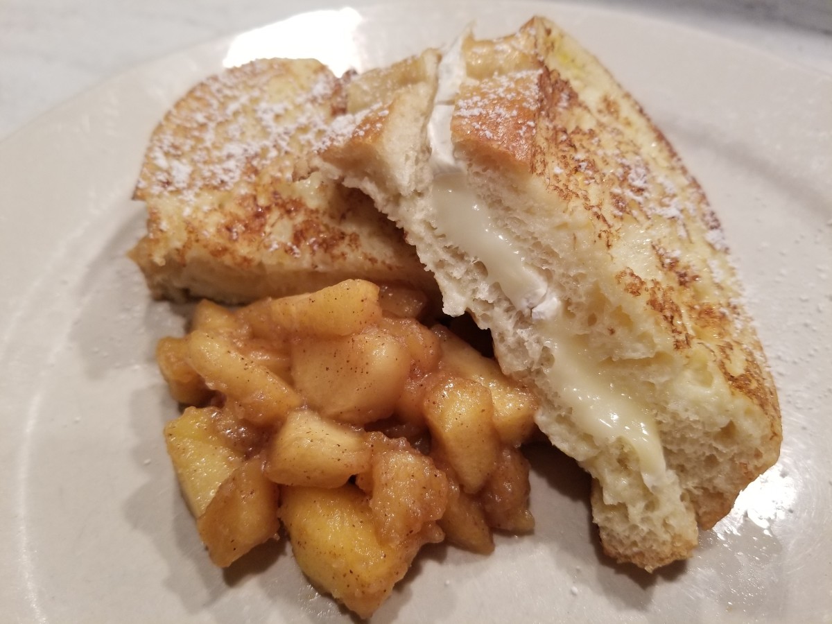 My favorite fruit with brie is apples or pears, simmered with sugar and a generous amount of cinnamon. Check out my recipe below!