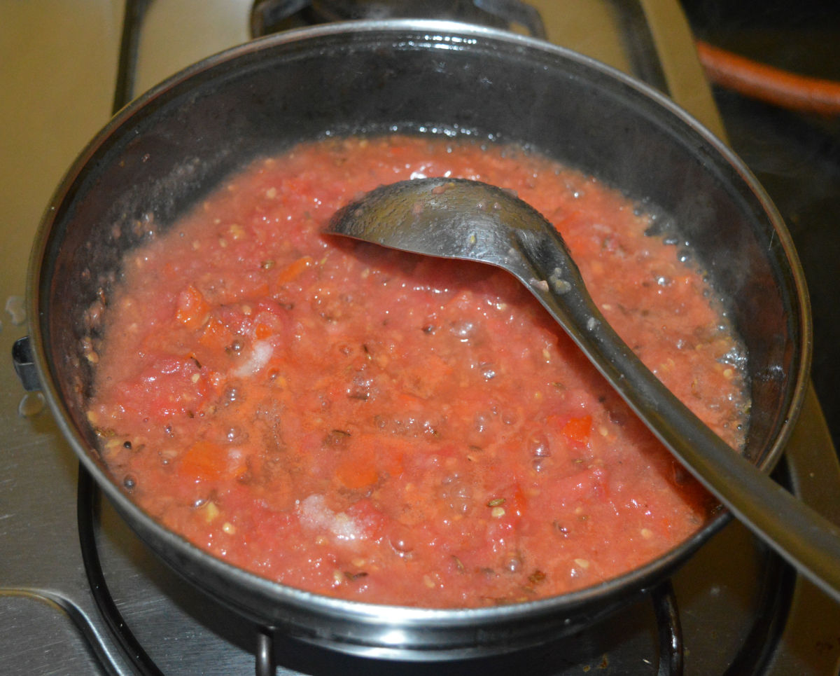 Cook the mixture until the tomatoes become mushy.