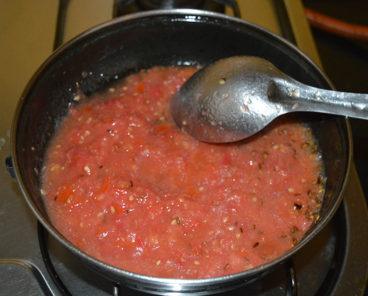 Add finely chopped tomatoes and salt. Cook it on medium-high heat for 5-6 minutes while stirring continuously. Alternatively, you can reduce the heat and cook it by covering the pan. In this method, stir occasionally.
