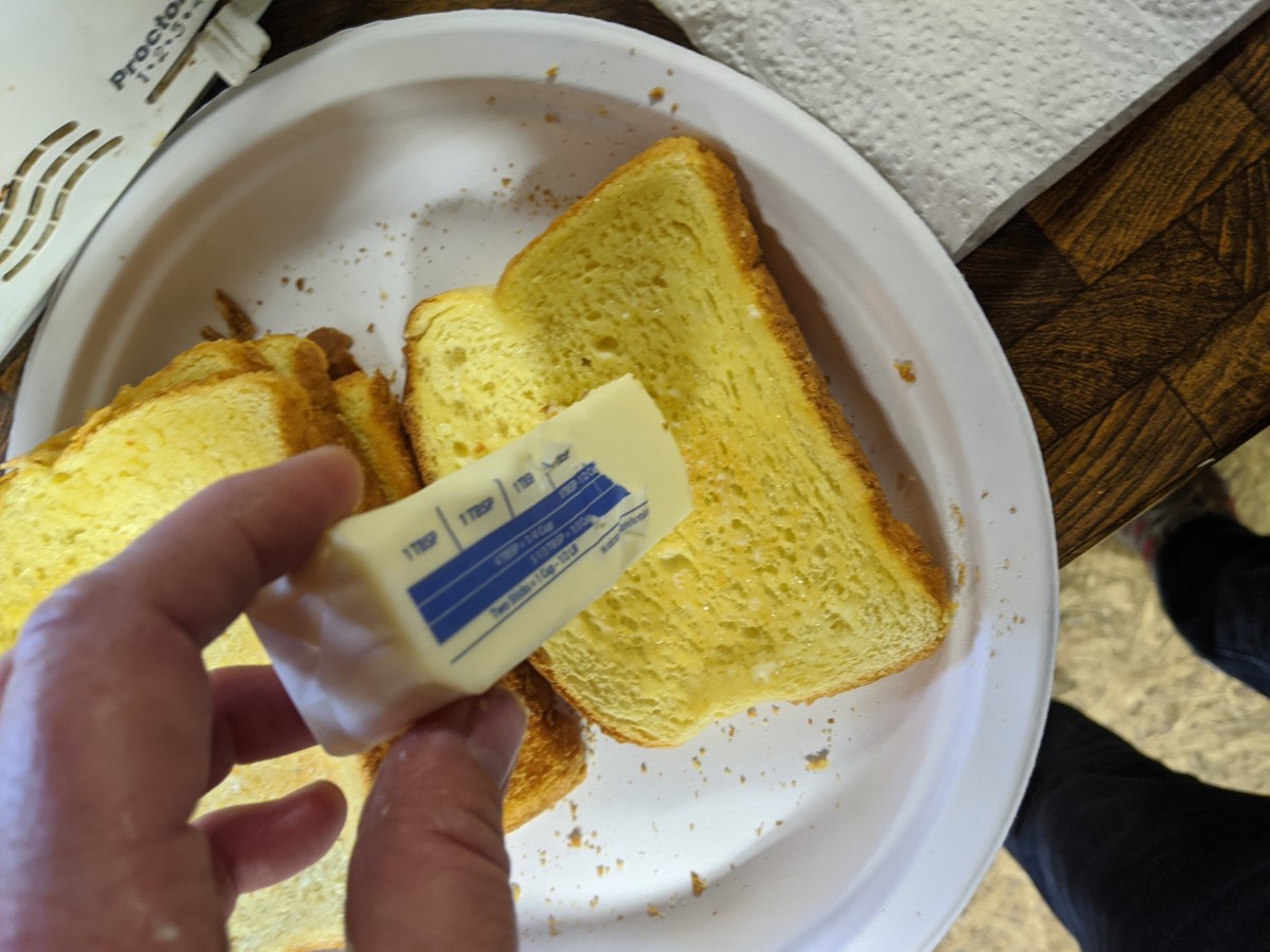 Rub butter on hot bread