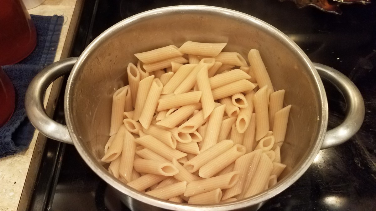 When your noodles are done, drain them in the sink.