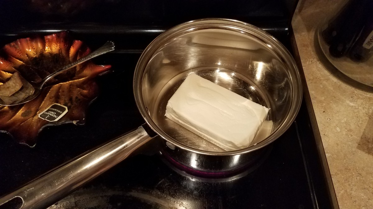 In another medium pot, start melting your cream cheese over medium-low heat.