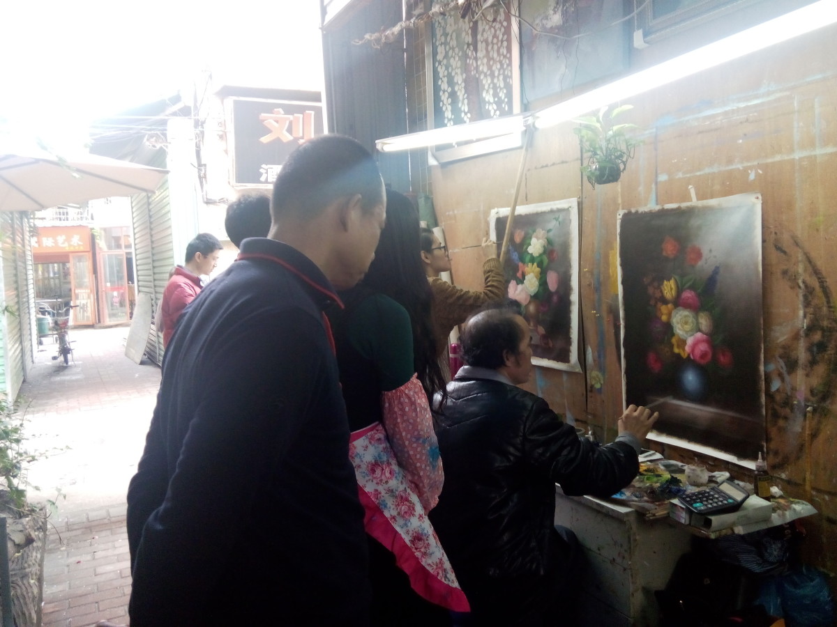 Artists painting in Dafen Arts Village, Shenzhen, China