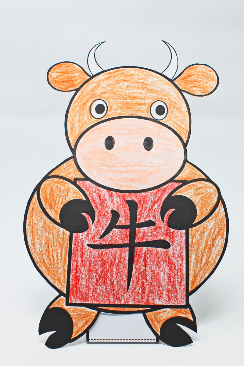 Using a printable template, children can color, cut, and assemble this standing decoration for Year of the Ox.