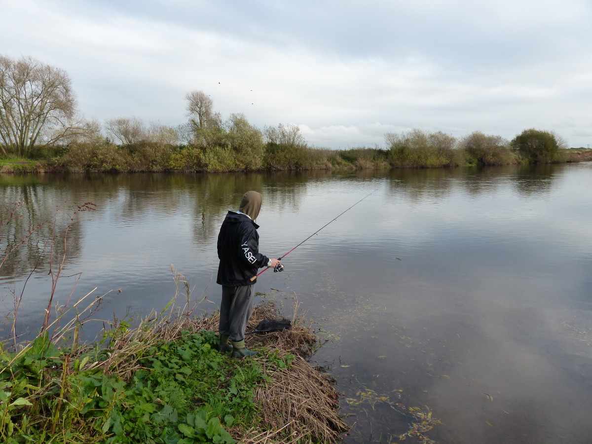 Fishing some slack water against a gravel bar in a back bay on the River Trent.